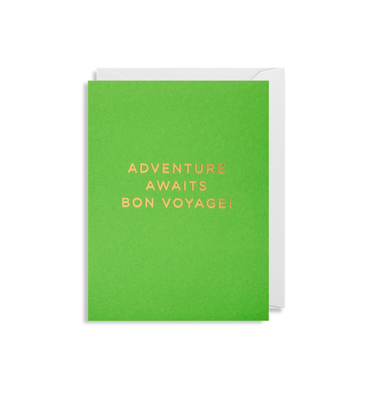 A lime green card with "Adventure Awaits Bon Voyage!" on the front